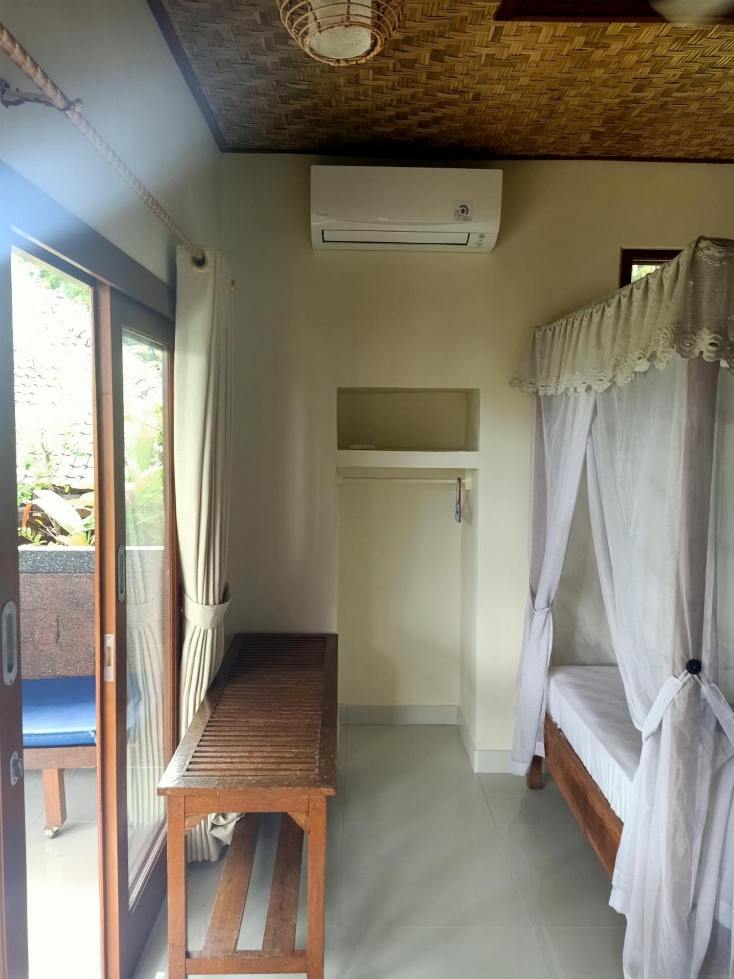 Appartamento Bamboo Bali Amed Camera foto